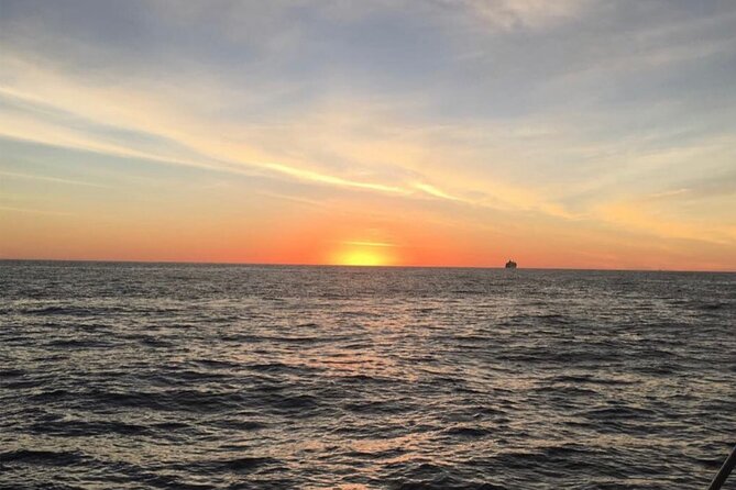 2 Hour Sunset Tour on Catamaran in Cabo San Lucas - The Pacific Side: Rock Formations, Divorce Beach, and Seasonal Whale Watching