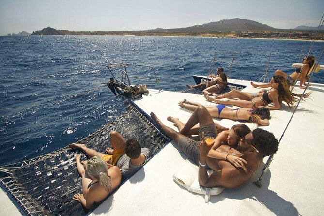 2 Hour Sunset Tour on Catamaran in Cabo San Lucas - Stop-by-Stop Route: Arch Views, Pelicans Rock, Sea Lions, and Lovers Beach