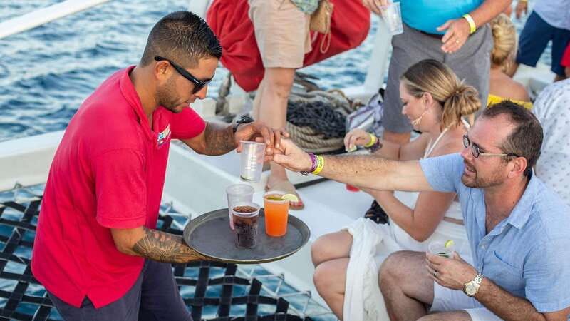 Cabo San Lucas: 2 Hour Sunset Cruise with Food and Wine - Past Lover’s Beach and the Arch: Watching Landmarks Glide By