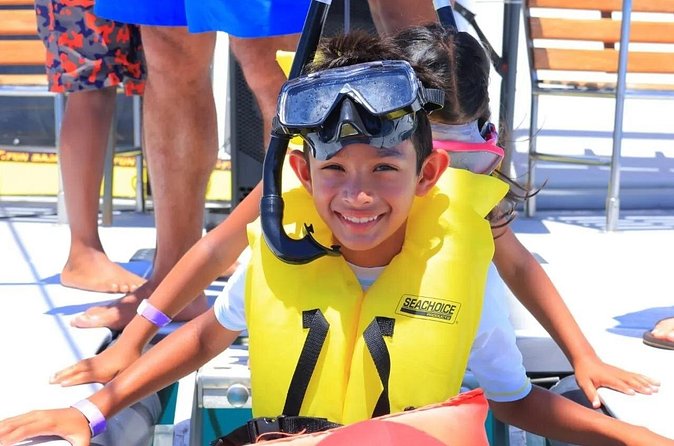 Cabo San Lucas Catamaran Cruise: Snorkel or Sunset Adventure - Open bar and onboard vibe: DJ music, shade, and sun nets