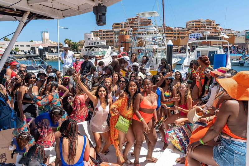 Cabo San Lucas: Hip Hop Boat Party with Unlimited Drinks - Heading to Muelle del Cabo and boarding the Cabo Wave