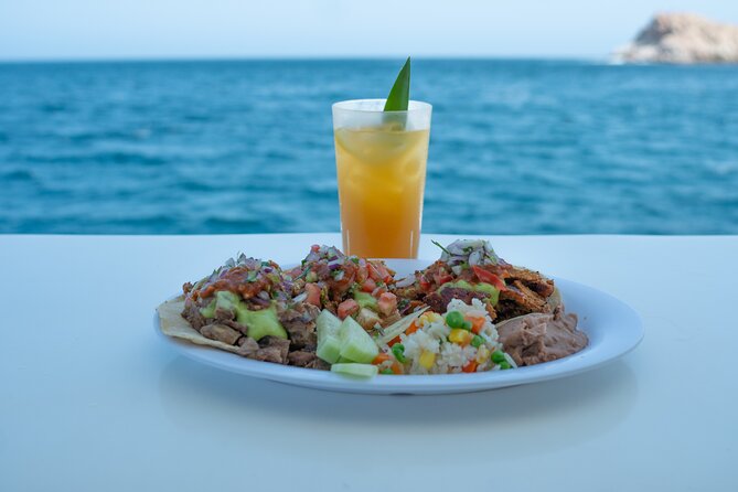 Cabo San Lucas Sunset Cruise Full dinner, open bar and transfer - Open bar expectations: domestic pours and an adults-only rule