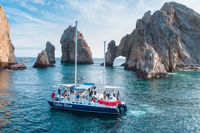 Cabo San Lucas Sunset Cruise with Open Bar and Snacks - Drinks, snacks, and that music-and-party mood
