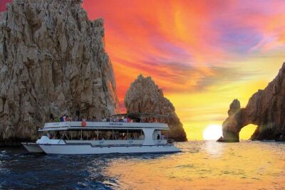 Cabo San Lucas Sunset Dinner Cruise with Open Bar - Party boat reality check: DJ, dancing, and sound levels