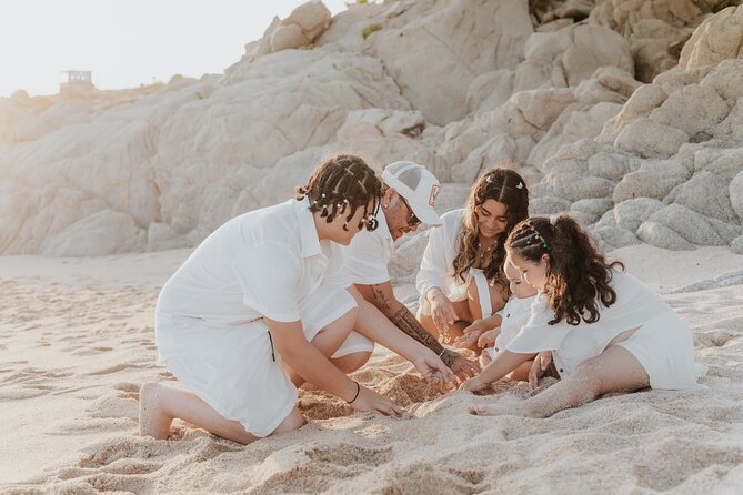 Family photo shoot on beach monuments - Cabo San Lucas family portraits, framed by El Arco and sunset
