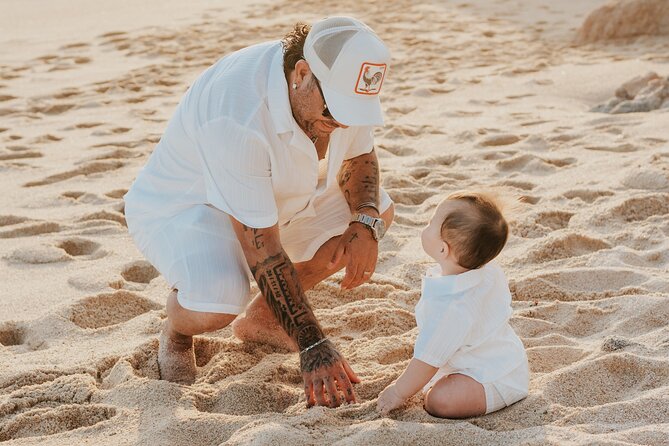 Family photo shoot on beach monuments - Should you book Waves and Frames for Cabo family photos?