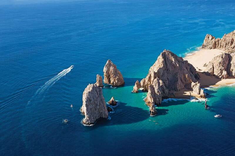 Los Cabos: Transparent Boat Tour with Optional City Tour - Cruising toward the Arch of Cabo San Lucas and sea lions