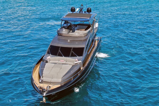 Luxury Black Yacht in Cabo - Pacific Coast cruise: rock formations and seasonal marine life
