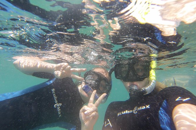 Pelican Rock Snorkeling and Sightseeing Adventure - What You’ll See on the Bay Cruise: Lover’s Beach and More