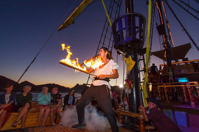 Pirate Ship Sunset Dinner and Show in Los Cabos - Buccaneer Queen Show on the Way Back: Fire, Acrobatics, and Big Crowd Energy