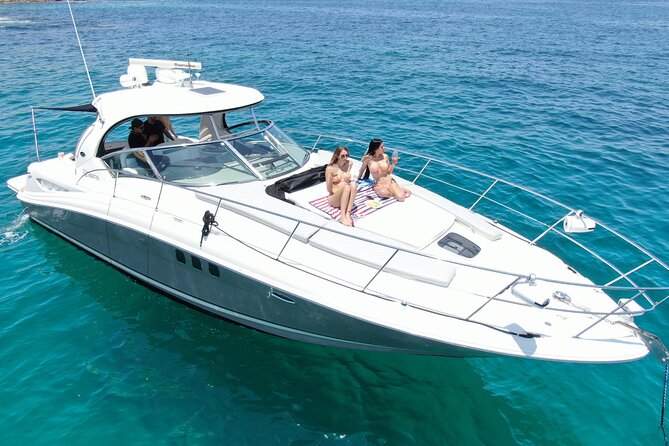 Private Yacht Sea Ray all-inclusive charter in Cabo - Water time on board: snorkeling, paddleboards, and that floating-mat comfort