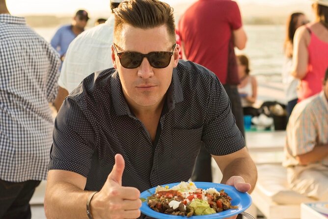 Sunset Dinner Cruise with Tequila & tacos - Boarding the 100-Foot Catamaran: Best Deck for Sunset Photos