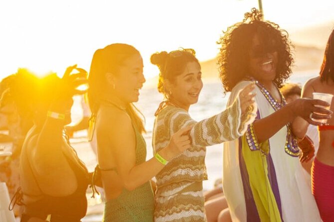 Sunset Party Cruise at Los Cabos - Onboard party mode: music, dancing, and crew energy