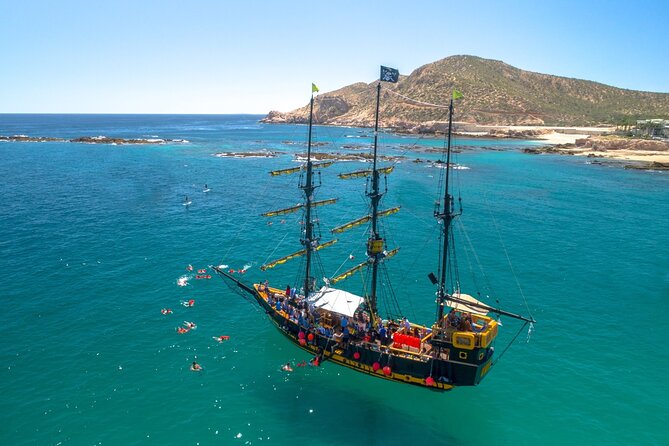 Treasure Hunt Snorkeling Lunch Cruise from Cabo San Lucas - Pirate energy onboard: music, games, and the open bar rhythm